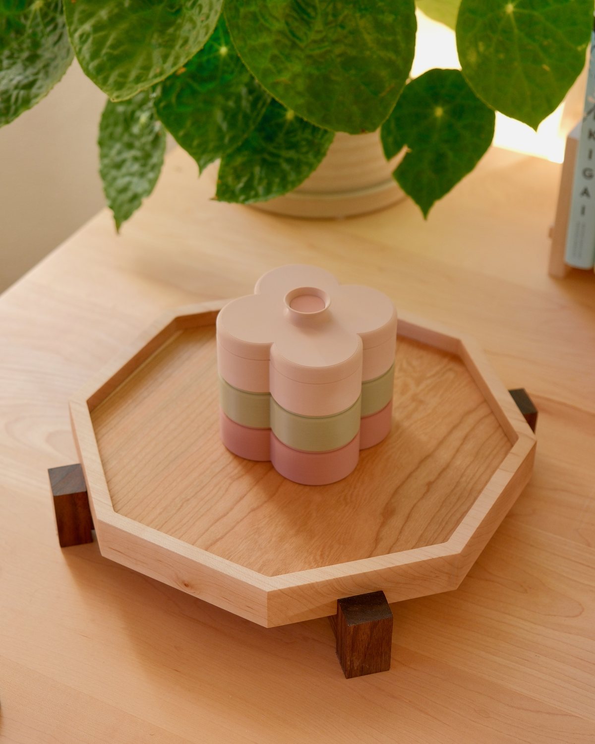 Three Fa Trinket Trays stacked in Dusty Blush, Pistachio and Rose on a maple Zen Tray