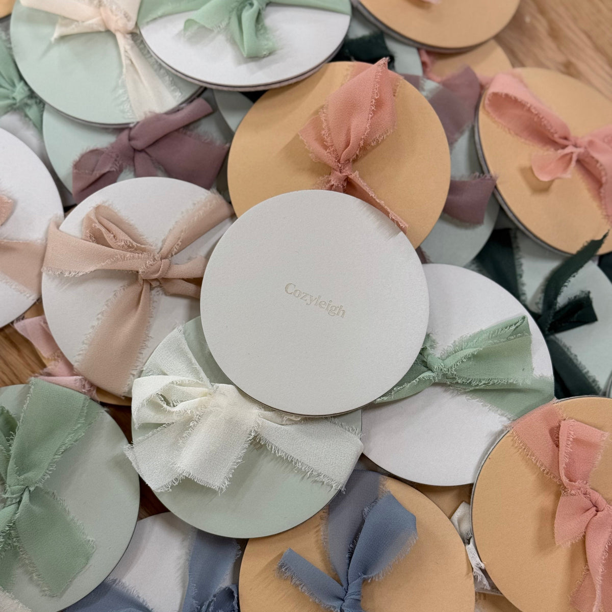 The first Cozyleigh coasters, tied with hand-dyed ribbon