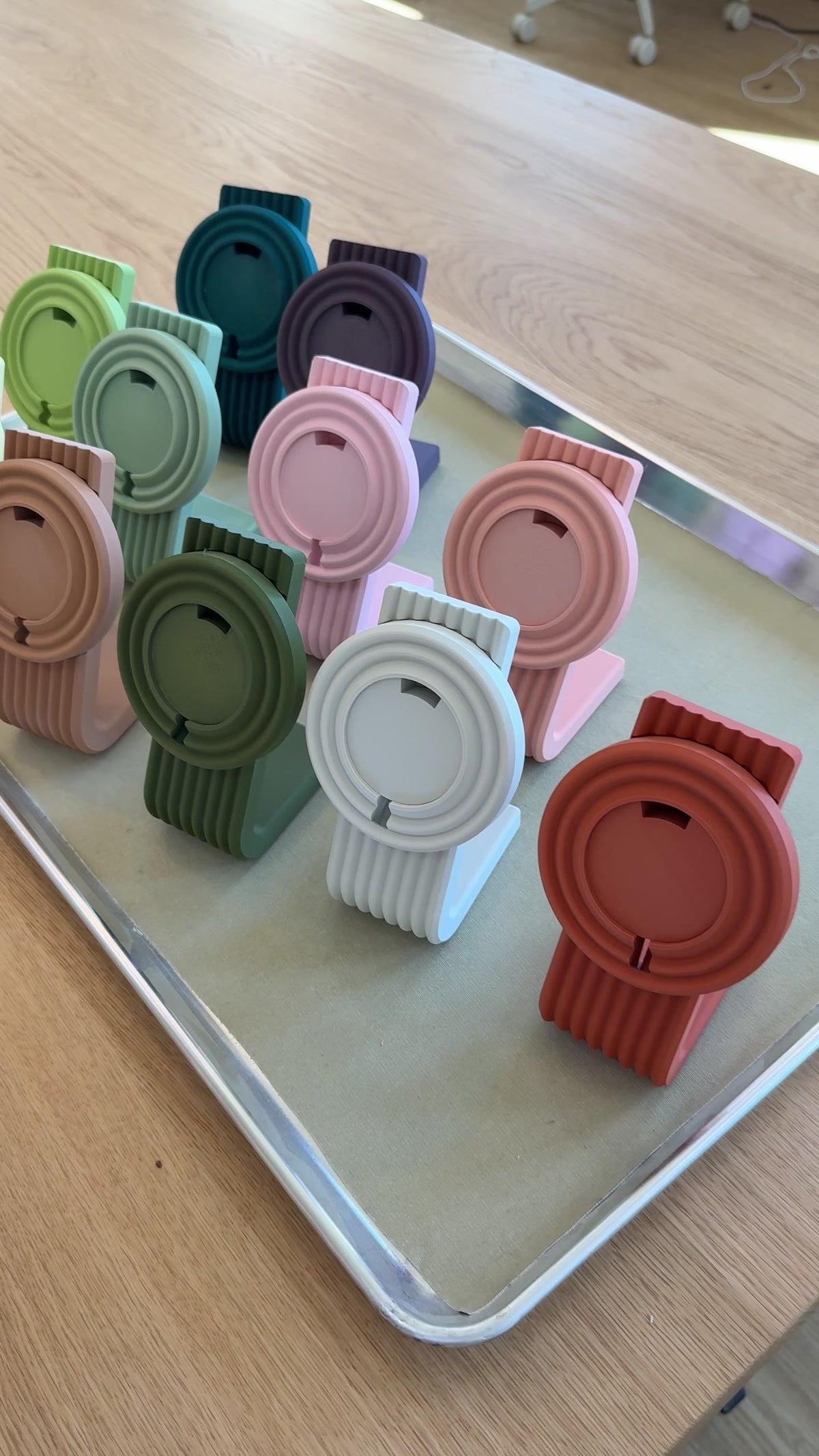 A tray of finished Zen MagSafe Charger Stands