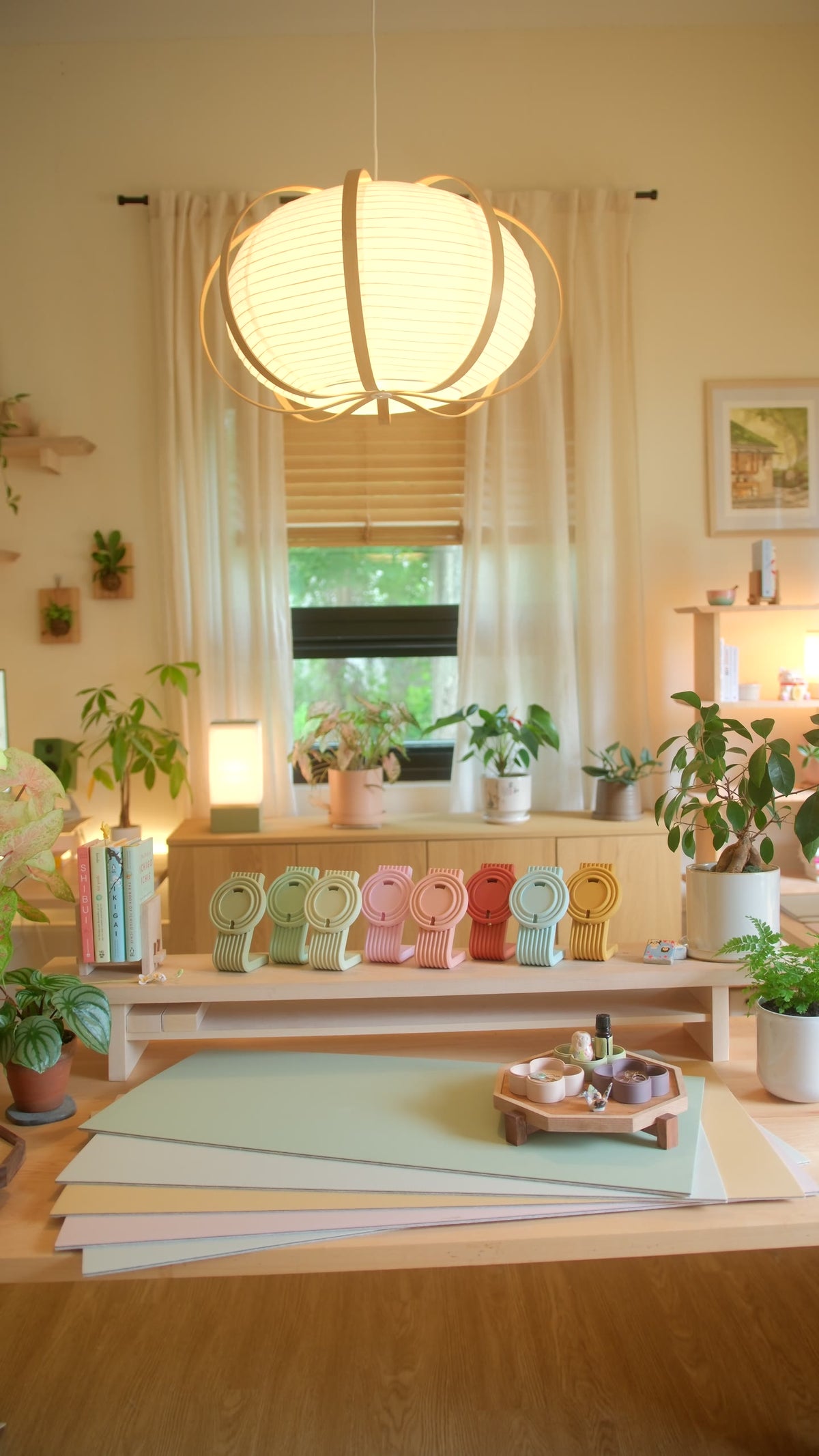 Cozyleigh desk mats and Zen MagSafe Charger Stands in the sunny studio