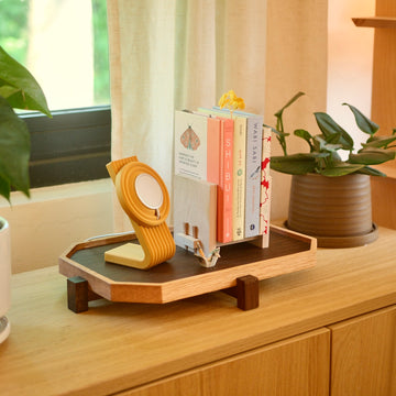 A Zen Tray with a charger stand on the sideboard