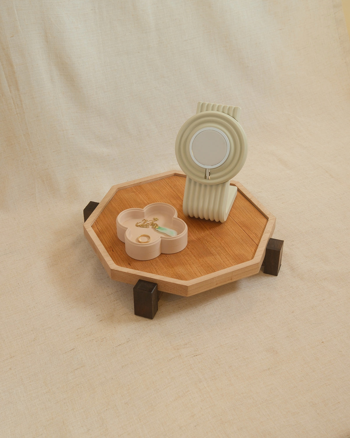 A charger stand and Fa trinket tray on a Zen Tray