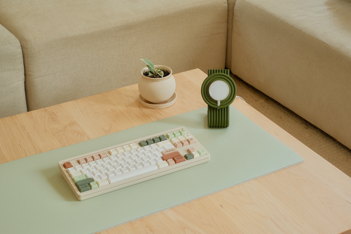 A Zen MagSafe Charger Stand paired with a desk mat