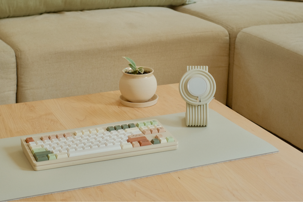 A Zen MagSafe Charger Stand paired with a desk mat