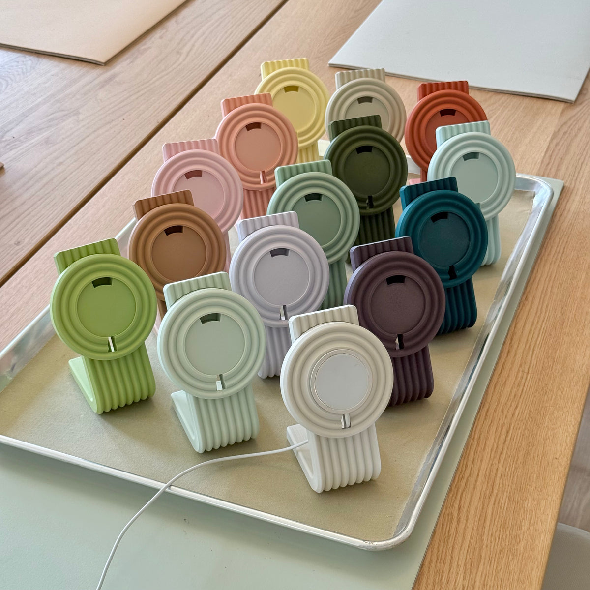A tray of finished Zen MagSafe Charger Stands
