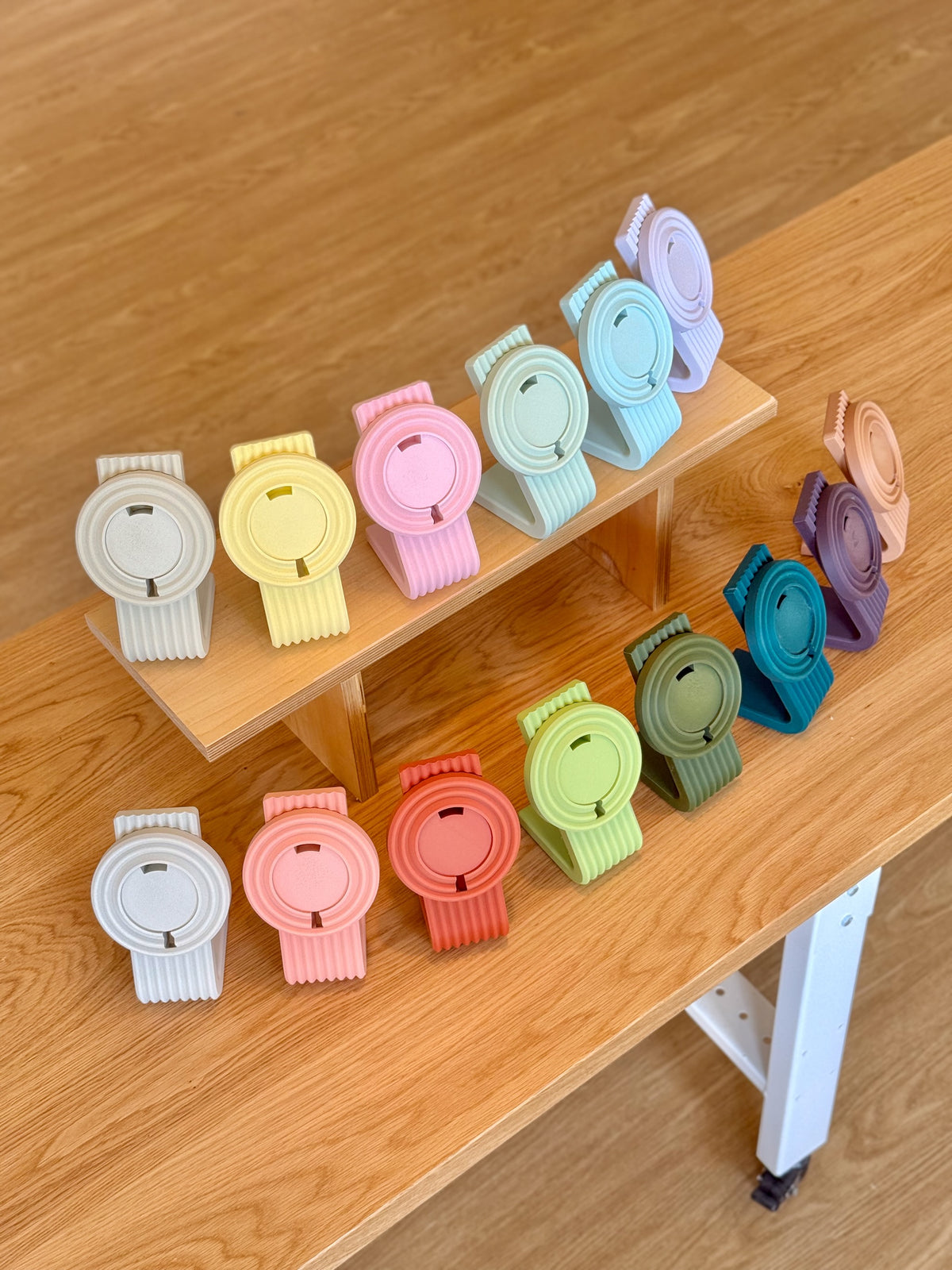 Zen MagSafe Charger Stands on a wooden wall shelf