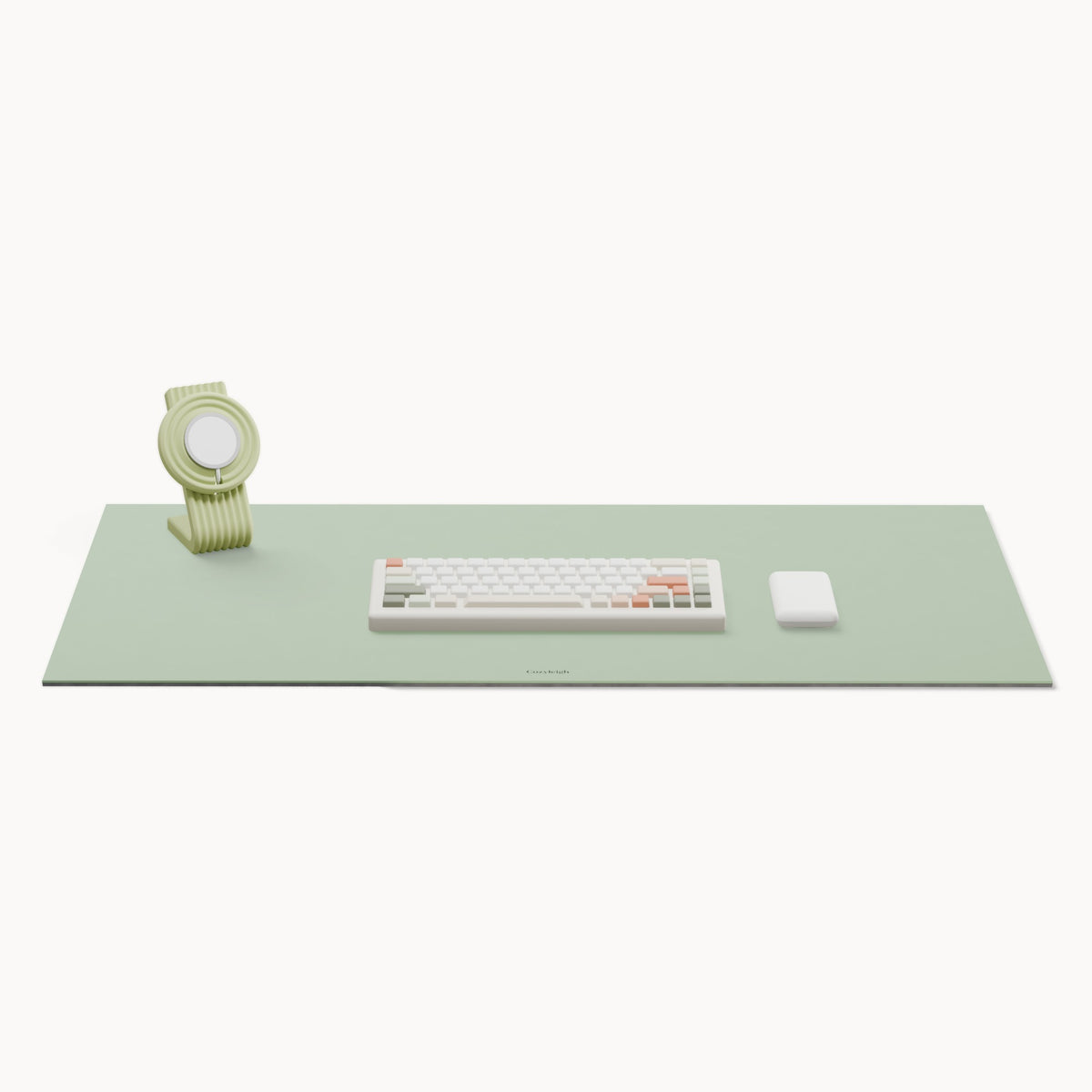 The cozy desk set: a Matcha desk mat with a Pistachio Zen charger stand at the back left, a keyboard and mouse in the middle for scale