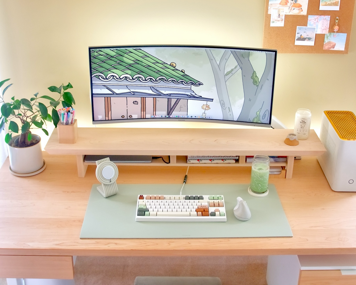 Cozyleigh Desk Mat in Matcha, Medium (32 × 15 in), a two-sided linoleum and merino wool desk mat