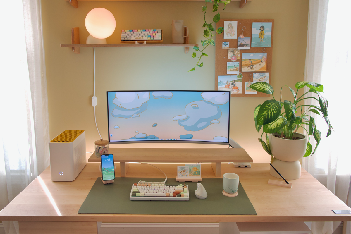 A desk setup styled on a Cozyleigh desk mat