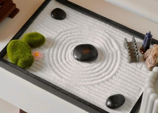 Raked sand around a single stone
