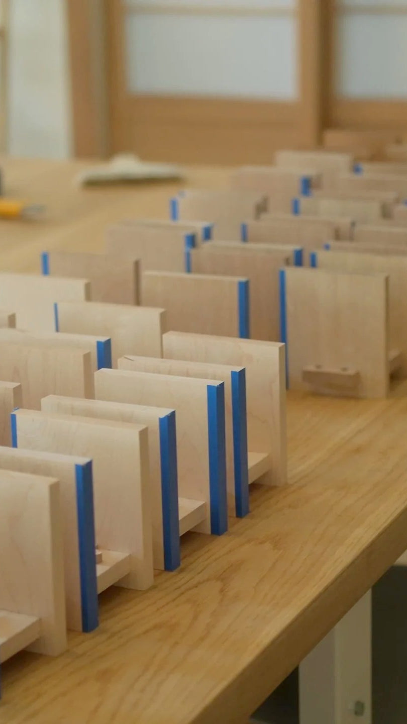 A full batch of Zen Book Stands on the studio table