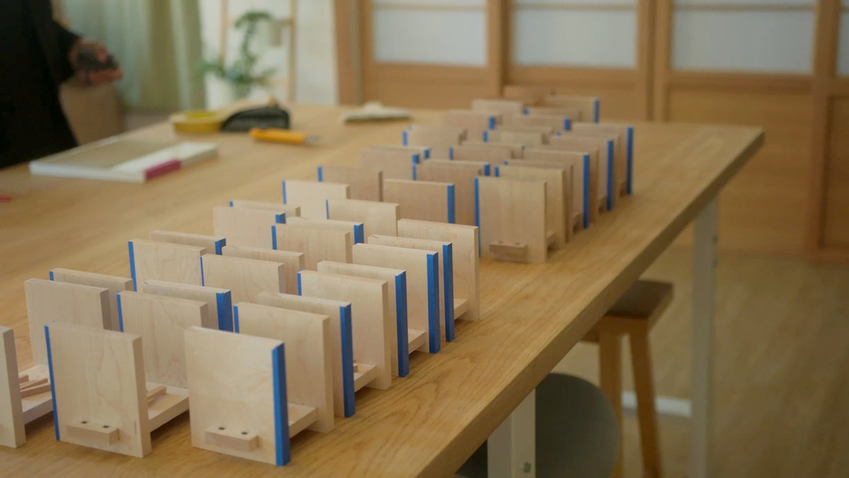 A full batch of Zen Book Stands on the studio table
