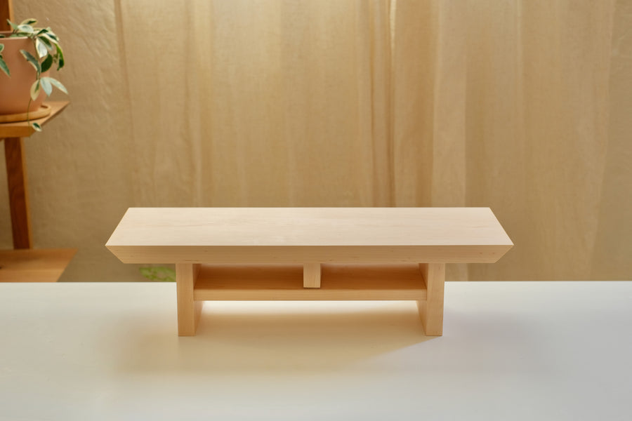 Zen Desk Shelf in Maple, Medium (24 in wide), front view on a white table