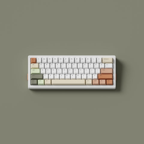 A keyboard with Zen Keycaps in Cherry profile on a sage green background