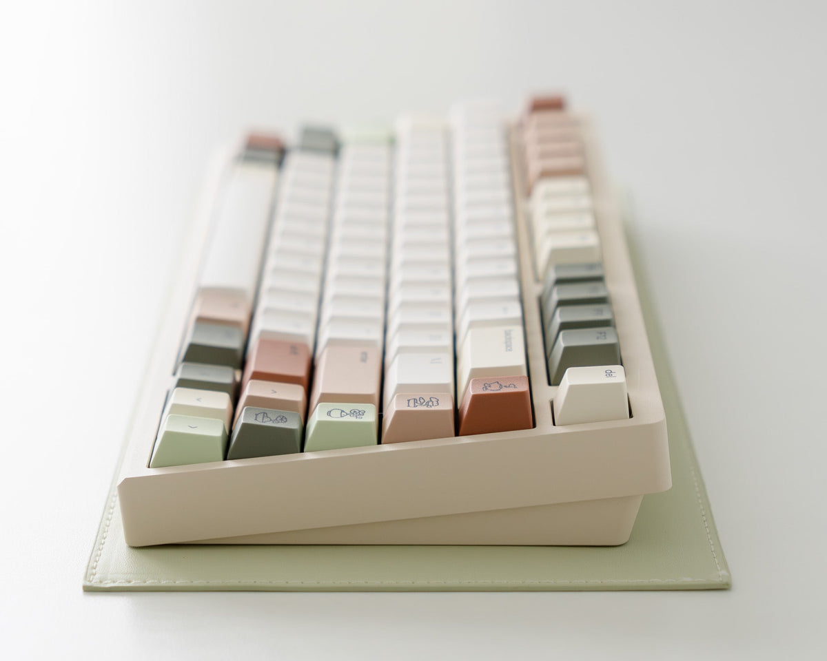 Side view of a keyboard with Zen Keycaps in Cherry profile